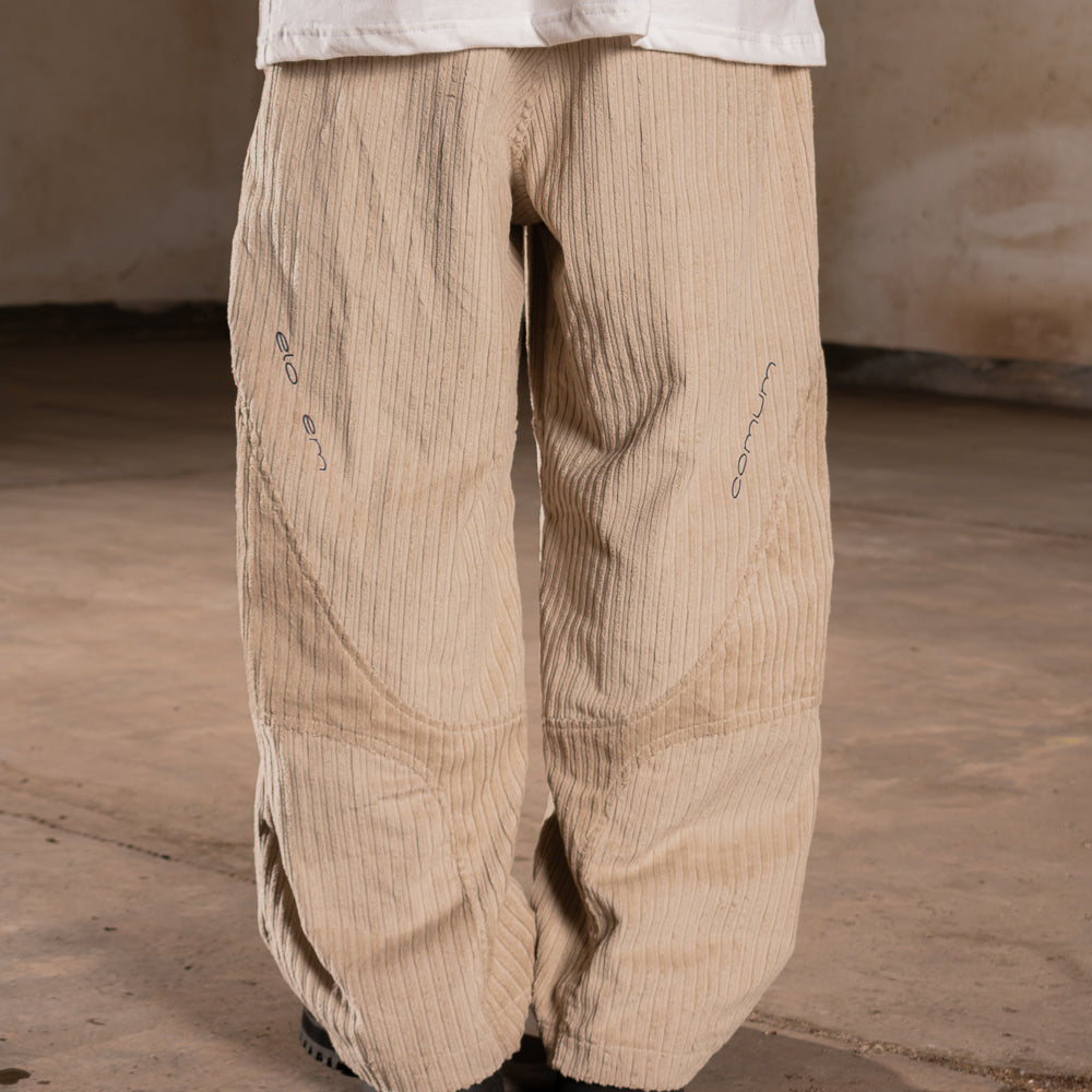 CALÇA ELO EM COMUM BRAILLE BEGE