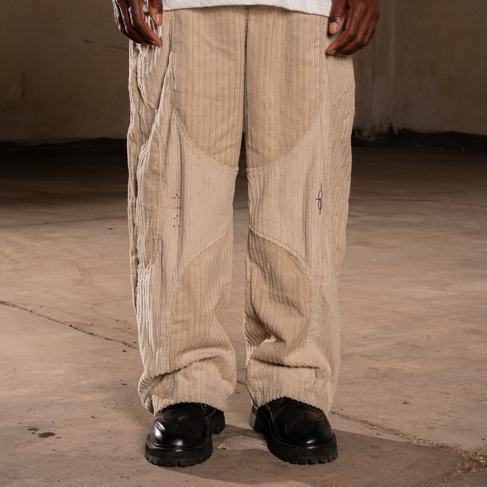 CALÇA ELO EM COMUM BRAILLE BEGE