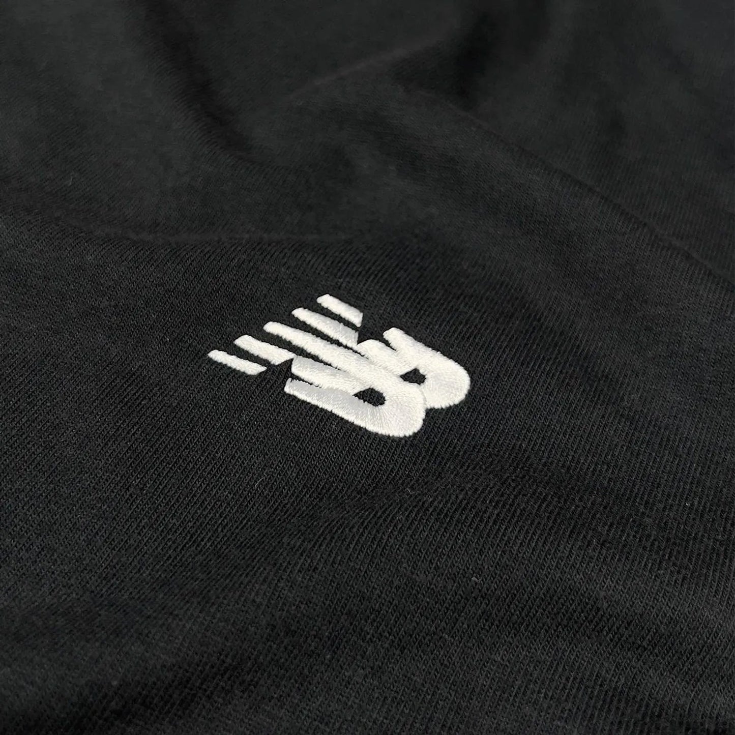 CAMISETA NEW BALANCE ESSENTIALS SL-PTO