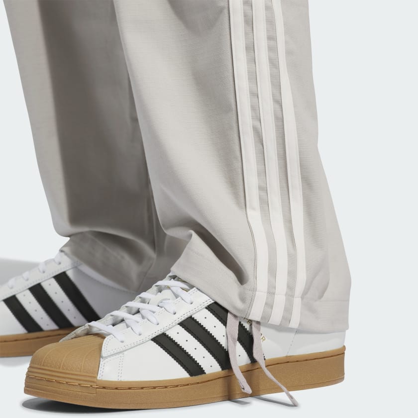 CALÇA ADIDAS SKT SUPERFIRE BEGE